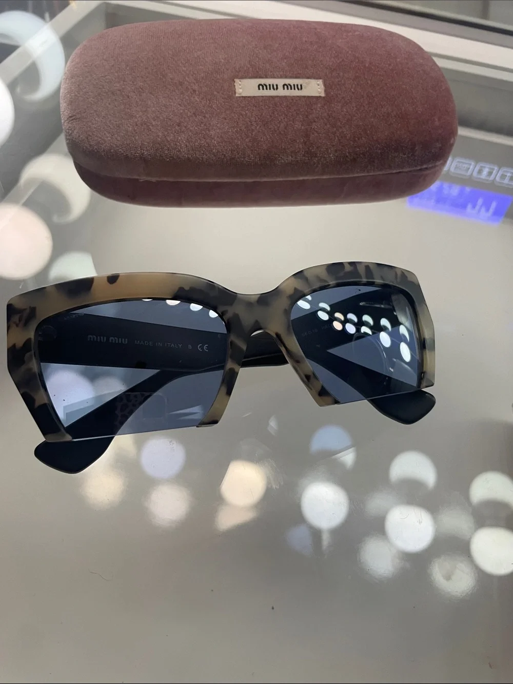 Miu Miu Tortoiseshell Cat-Eye Sunglasses with Dark Blue Lenses